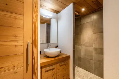 a bathroom with a sink and a mirror at Sapelli apartment Argentière Chamonix - by EMERALD STAY in Chamonix-Mont-Blanc