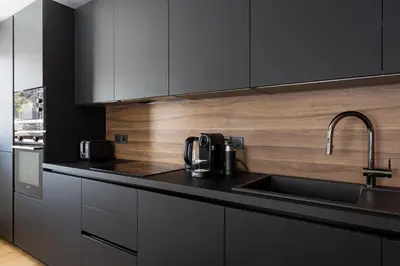 a kitchen with a sink and a counter top at Interlude Megeve in Megève