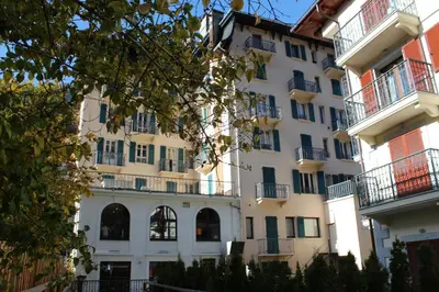 a building with balconies on the side of it at Appartement Le Lutetia in Chamonix-Mont-Blanc