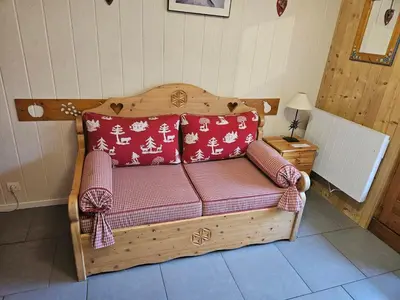a room with two bunk beds and a door at Chalet La Piste Bleu in Saint-Gervais-les-Bains