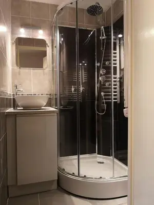 a bathroom with a shower and a sink at Chalet La Piste Bleu in Saint-Gervais-les-Bains