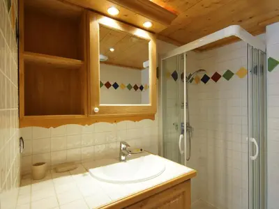 a bathroom with a sink and a shower at Apartment Villa Princesse by Interhome in Chamonix-Mont-Blanc