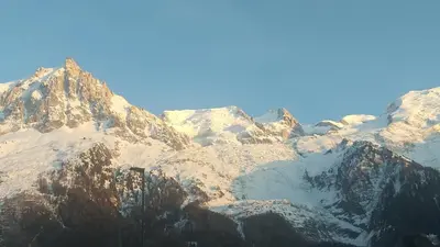 a mountain covered in snow and ice at studio plein sud vue Mont Blanc CHAMONIX in Chamonix-Mont-Blanc