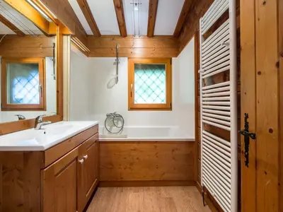 a bathroom with a sink and a bath tub at Chalet plein soleil 2 chambres à Megève, proche pistes - FR-1-453-255 in Megève