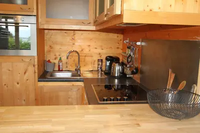 a kitchen with a sink and a counter top at studio residence Grands Montets in Chamonix-Mont-Blanc