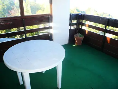 a white table in a room with a window at Résidence Les Cristaux Du Haut - Cristaux 51 MAE-5310 in Combloux