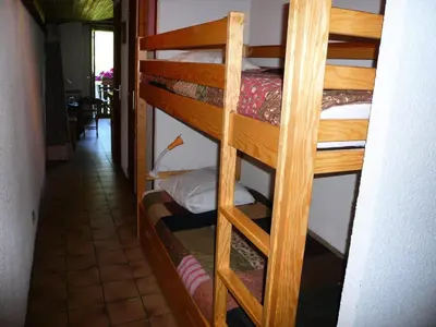 a couple of bunk beds in a room at Résidence Les Granges D'ormaret - Grandes d'Ormaret 16 MAE-5318 in Combloux