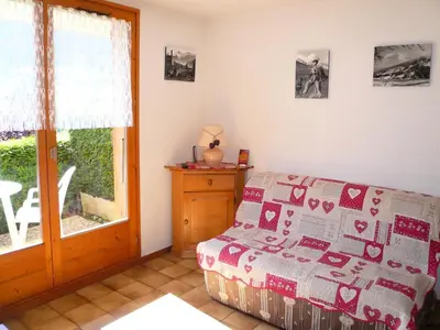 a bedroom with a bed and a window at Résidence Les OrÉades - Oréades B04 MAE-5329 in Combloux