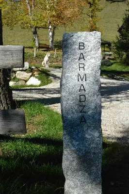 a stone sign that reads benjamin analoria on a path at BARMADZA Mazots de Charme in Demi-Quartier