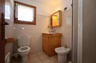 a small bathroom with a toilet and a sink at Résidence Les Eaux Rousses - Les Eaux Rousses MAE-9964 in Les Houches