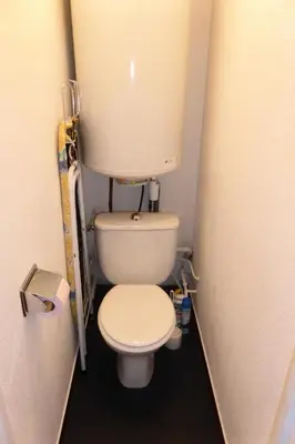 a small bathroom with a toilet in a stall at Résidence Le Royal - Royal 12 MAE-9034 in Combloux
