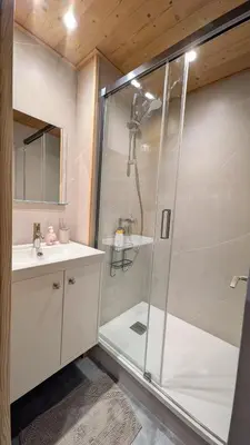 a bathroom with a shower and a sink at L'alpage in Chamonix-Mont-Blanc