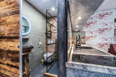 a bathroom with a sink and a bath tub at Le Tête Pied Centre/Télécabine Saint-Gervais in Saint-Gervais-les-Bains