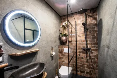 a bathroom with a sink and a mirror at Le Tête Pied Centre/Télécabine Saint-Gervais in Saint-Gervais-les-Bains