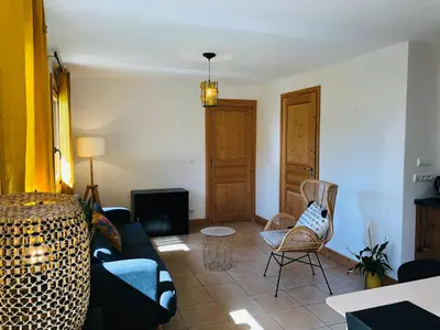 a living room with a couch and chairs at Chalet Cosy in Saint-Gervais-les-Bains