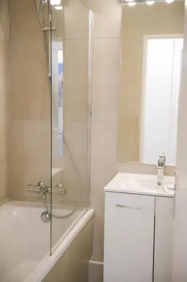 a bathroom with a shower and a sink at Appartement Cosy - Aiguille du Midi in Chamonix-Mont-Blanc