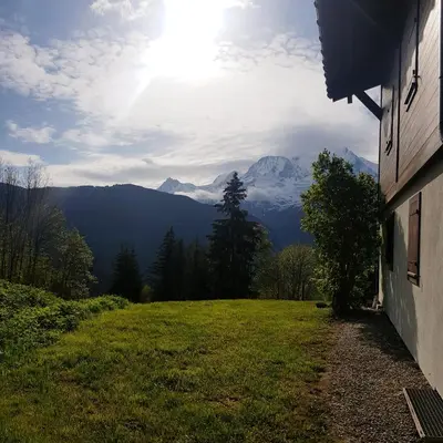 a view of a mountain from the side of a house at Appartement Saint Gervais les Bains vue imprenable Mont Blanc in Saint-Gervais-les-Bains