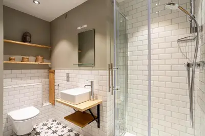 a bathroom with a sink and a shower at Concordia 7 Apartment - Chamonix All Year in Chamonix-Mont-Blanc