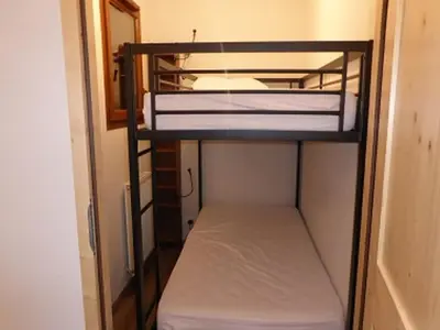 a small room with two bunk beds in it at Duplex Moderne au Centre avec Balcon, 6 Pers. - FR-1-629-13 in Samoëns