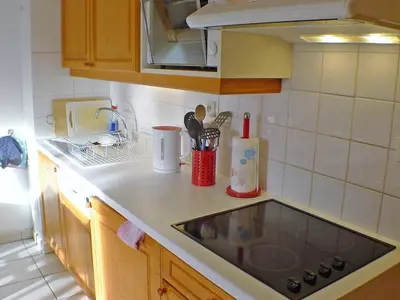 a kitchen with a sink and a counter top at Spacieux appartement 4 pièces avec WIFI, animaux acceptés, parking - FR-1-629-14 in Samoëns