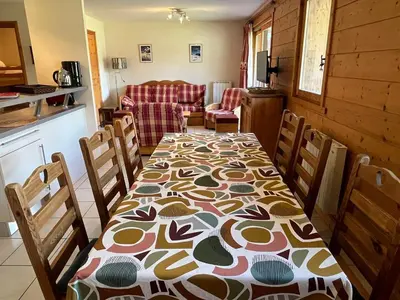 a dining room with a table with a pattern on it at Grand T3 avec cabine - 6 à 8 pers. - Samoëns - FR-1-629-4 in Samoëns