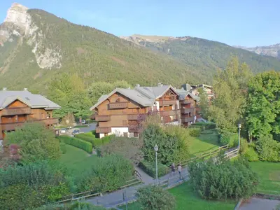 a resort in the mountains with a mountain at Appartement 5 pers. avec balcon privé et parking à Samoëns - FR-1-629-20 in Samoëns
