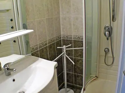 a bathroom with a shower and a sink and a shower at Appartement 2 pièces avec animaux admis, balcon et garage - FR-1-629-27 in Samoëns