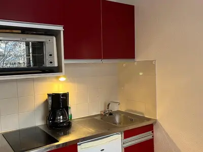 a kitchen with a sink and a microwave at Studio cosy au centre de Samoëns, 4 pers, proche commodités - FR-1-629-65 in Samoëns