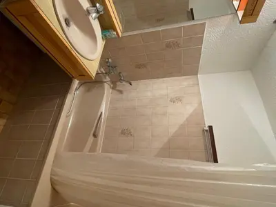 a bathroom with a shower with a sink and a toilet at Studio calme pour 4 pers. avec terrasse à Samoëns - FR-1-629-30 in Samoëns