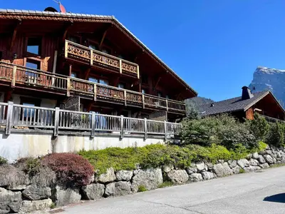 a large building with balconies on the side of it at Appartement moderne 3 chambres avec balcon à Samoëns - FR-1-624-25 in Samoëns