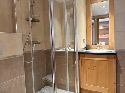 a bathroom with a shower and a sink at Charmant T3 au cœur de Samoëns avec jardin, parking et proche ski-bus - FR-1-624-16 in Samoëns