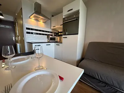 a bathroom with two glasses of wine on a counter at Studio cosy aux pieds des pistes, vue splendide - FR-1-624-53 in Samoëns