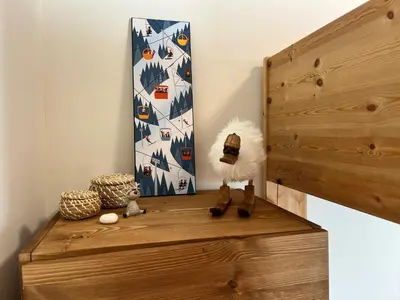 a wooden box with a picture on the wall at Appartement T3 au cœur de Samoëns avec balcon et parking privatif - FR-1-624-54 in Samoëns