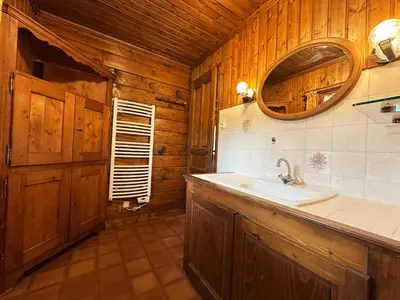 a bathroom with a sink and a mirror at Chalet familial avec jardin et cheminée, animaux acceptés - FR-1-624-67 in Samoëns