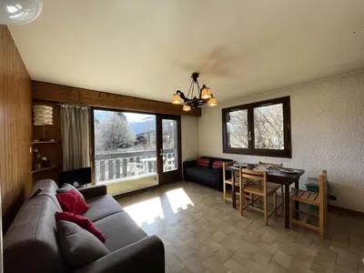 a living room with a couch and a table at Résidence Les Granges De Colomb - Granges de Colomb B106 MAE-5322 in Combloux
