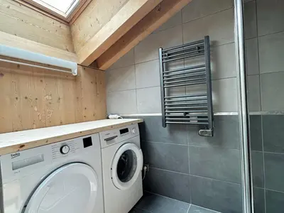 a laundry room with a washing machine in it at Superbe duplex, proche télécabine, animaux acceptés - FR-1-624-13 in Samoëns