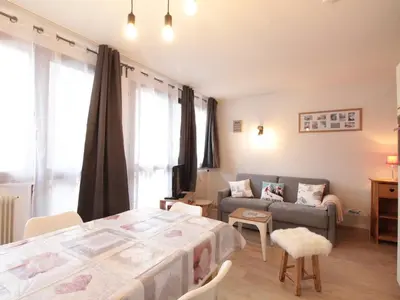 a living room with a bed and a couch at Charme au centre d'Arâches : 2 pièces + coin montagne, 4/5 pers, proche pistes et commerces - FR-1-572-154 in Les Carroz d'Araches