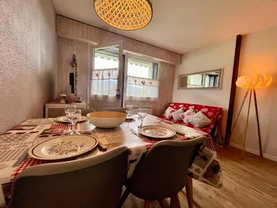 an apartment building with balconies on the side of it at Studio cosy au centre de Samoëns avec animaux acceptés et parking - FR-1-624-70 in Samoëns