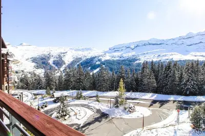 a view from a balcony of a snow covered mountain at South-facing renovated 2-bed apartment Les Terrasses d'Eos in Flaine