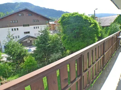 a view of a town from a balcony at T2 calme à Samoëns - 4 pers, animaux admis - FR-1-629-70 in Samoëns