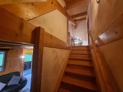 a staircase in a tiny house at Chalet Tontine, 3 bedrooms, sauna, terrace and great views ! in Les Houches