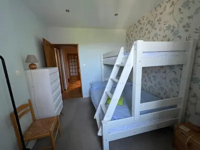 a bedroom with two bunk beds in a room at onlysaintg - Apartment Bernadette Spacious 4 bedrooms Great views, 120 m2 Only 500m from the centre and ski lift GREAT YEAR ROUND in Saint-Gervais-les-Bains