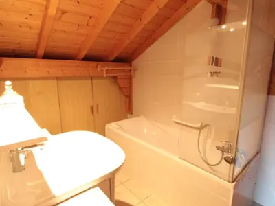 a bathroom with a shower and a toilet and a sink at Chalet 3 chambres calme, poêle à bois, proche piste et village, 6/8 pers, garage et parking - FR-1-572-243 in Les Carroz d'Araches