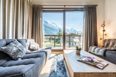 a living room with a view of a mountain at Chalet Jatoba Chamonix - by EMERALD STAY in Chamonix-Mont-Blanc