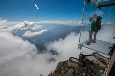 a couple of people standing on top of a mountain at Maison du Roi - Happy Rentals in Chamonix-Mont-Blanc