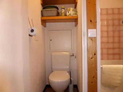 a small bathroom with a toilet and a sink at Résidence Combettes - Combettes D292 MAE-5624 in Les Contamines-Montjoie