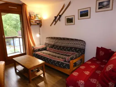 a living room with a couch and a table at Résidence L'enclave - Enclave J717 MAE-5744 in Les Contamines-Montjoie