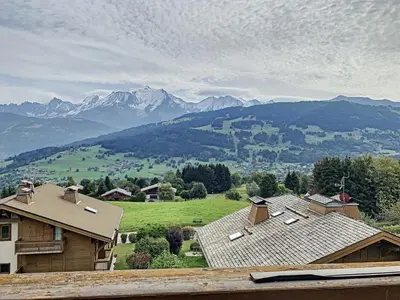 a view of a mountain from a house at Duplex cosy à deux pas des pistes avec parking à Combloux - FR-1-560-80 in Combloux