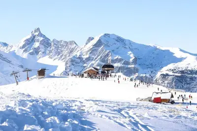 a group of people standing on a snow covered mountain at Samoëns 1600 les cimes in Samoëns