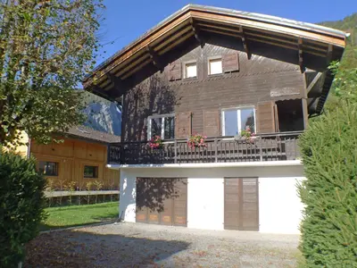 a house with a balcony on the front of it at Chalet Gentiane - un lieu idéal pour des vacances en famille ou entre amis - FR-1-629-88 in Samoëns